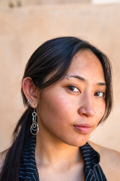 confident headshot facial expression looking at camera