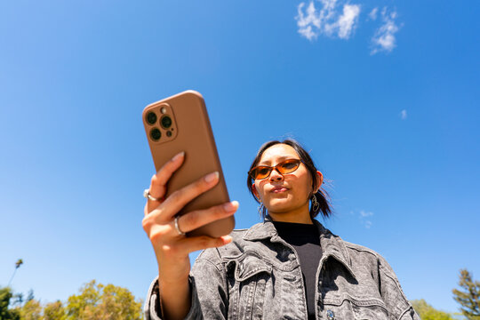 wide angle portrait using mobile phone focused texting