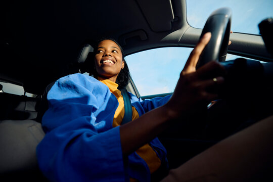 Woman drives a car