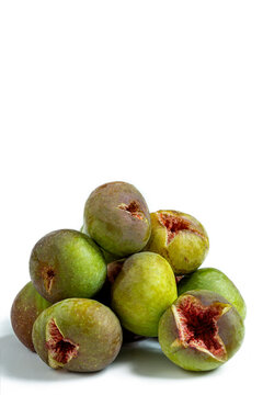 Fresh Figs Stacked on a White Background