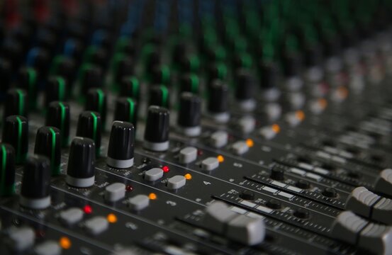 Mixer surface. An electronic device that controls audio signals whether for music software DAW or for mixing DJ tracks using physical buttons, faders and knobs
