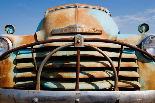 Old rusty chevy pickup truck front grill