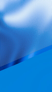 Shiny blue metal surface with dotted pattern