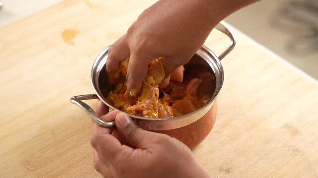 Marinating Chicken with Ginger Garlic Paste and Turmeric