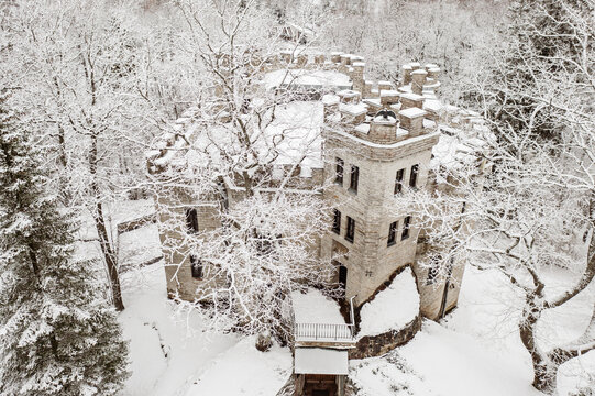 Old castle in the winter Glen park. Tallinn, Estonia.