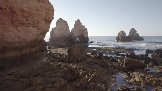 Forward flight between coastal cliffs and sea stacks in Portugal