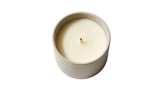 Isolated unlit scented candle in a textured ceramic container with natural wax for aromatherapy.
