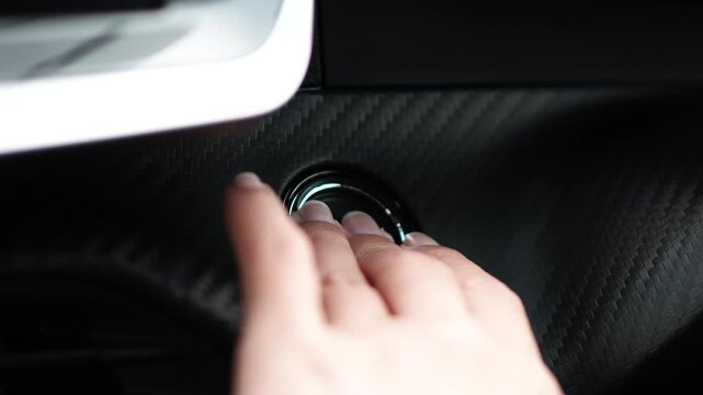 Pressing Engine Start Button Inside a Car, Slow Motion