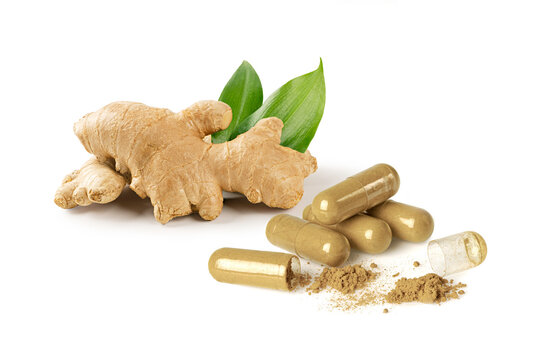 Natural ginger rhizome with green leaves paired with herbal extract capsules and loose powder. for supplement branding, healthy lifestyle, and traditional medicine on white background.