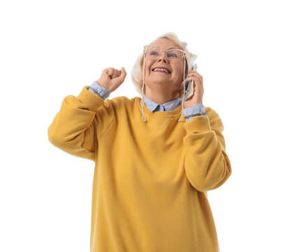 Healthy aging and senior tech, happy elderly woman talking on smartphone with excitement and joy isolated on a white background
