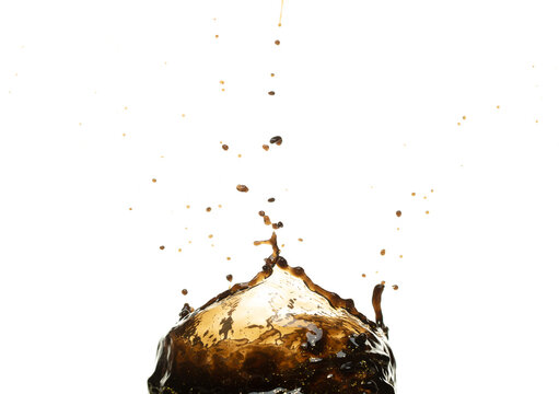 Black Coffee, tea, espresso, cola pouring and splash as crown water. Coffee, tea, espresso, cola explode bubble splash in mid air. White background isolated photo with gold glitter