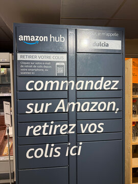 Amazon Hub parcel locker in a grocery store - Rouen, France - September 7, 2026