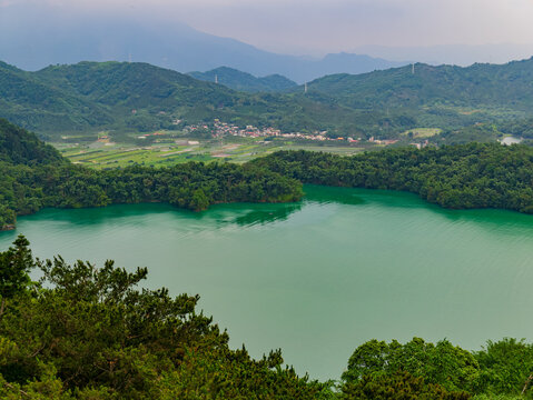Aerial view of emerald lake and green mountains in Nantou