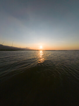 Sunset Over Calm Lake Waters