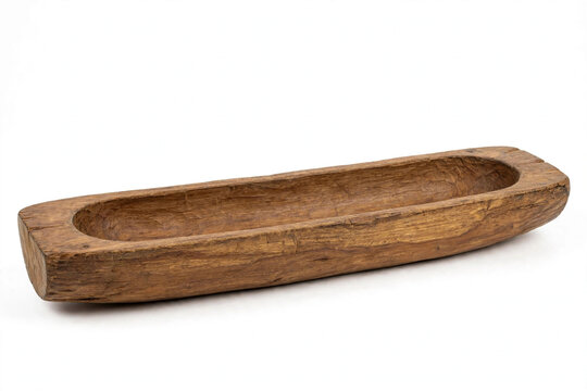 Traditional wooden rice mortar trough on white