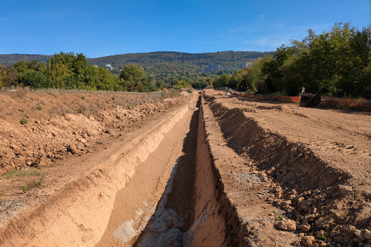 Heidelberg, Germany - July 30th 2026: Burrow at construction site of The South German Natural Gas Pipeline (SEL)