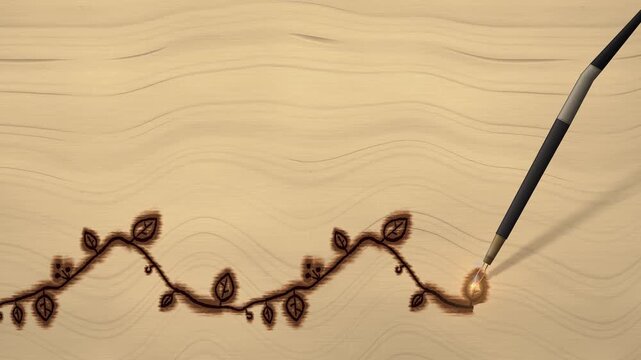 Wire tip wood burning pen traces a botanical leaf and berry vine border into a light maple board, seamless loop with glowing hot tip and thin smoke