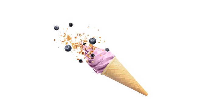 Dynamic falling blueberries and biscuit crumbs with pink soft serve ice cream cone isolated on black background
