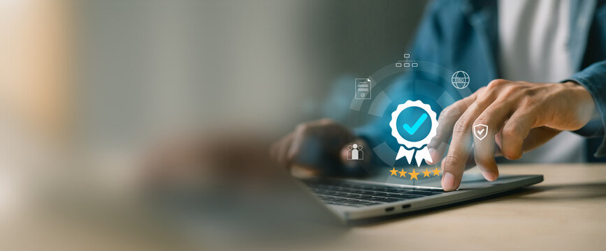 Businessman using digital interface showing certification badge, quality assurance, standards compliance and standard business concept.