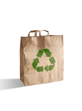 Brown paper bag showing green recycling symbol