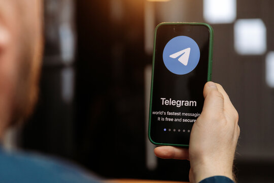 iPhone display with Telegram messaging and audio calling app