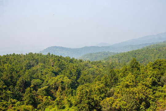 Explore the scenic Ayodhya Hills of Purulia, West Bengal, featuring lush green forests, winding roads, rocky mountains, and beautiful countryside landscapes.
