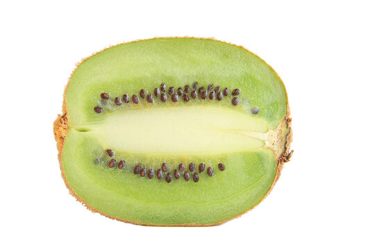 Front view of single ripe organic green kiwi fruit half slice displaying black seeds isolated white background