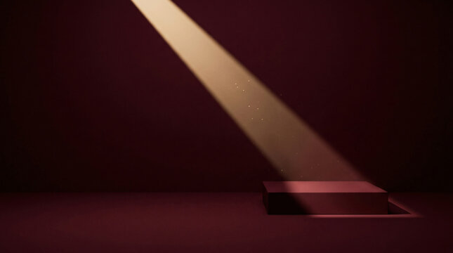 Pedestal illuminated by a diagonal light beam in a monochrome studio