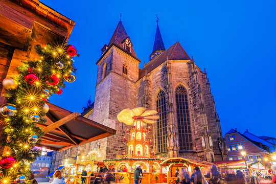 Ansbach, Germany. View of the christmas market at Martin Luther Square with the church St. Johannis.