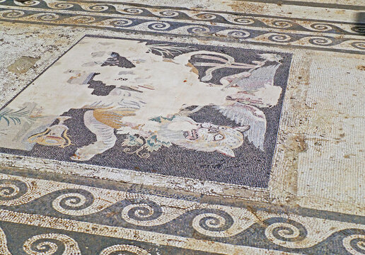 Hellenistic mosaic of winged Dionysus riding a tiger, a masterpiece floor mosaic artwork at Delos archaeological site, historic home ruins in Greece