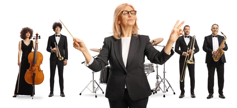 Female conductor with a baton in front of orchestra