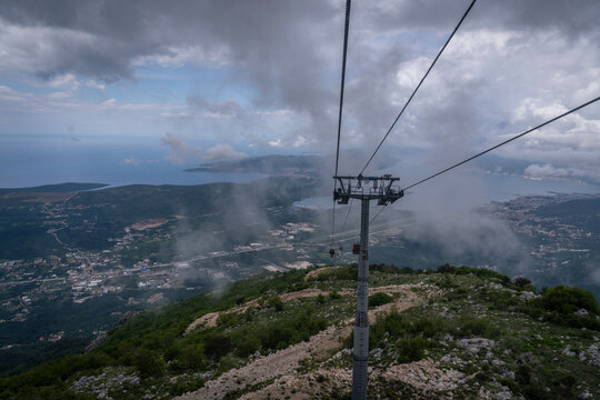 Aerial panoramic view of Kotor cable car in Montenegro with Tivat city and bay background