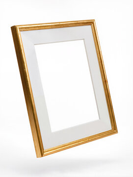 empty gold picture frame with a white mat floating at a slight angle above a soft shadow on white, vertical studio photo, conceptual display, cherished memories and elegant home gallery concept