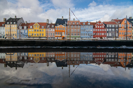 Nyhavn waterfront houses reflecting in Copenhagen