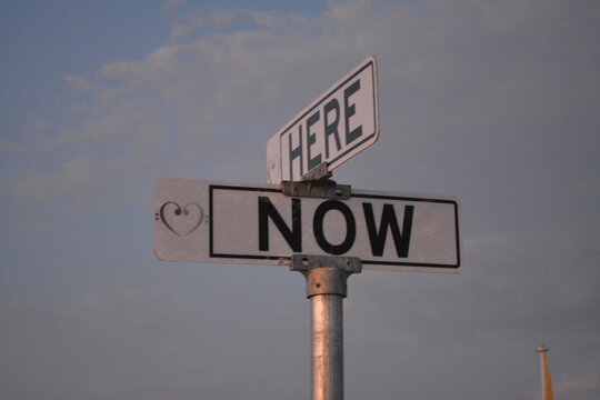 Here and now sign