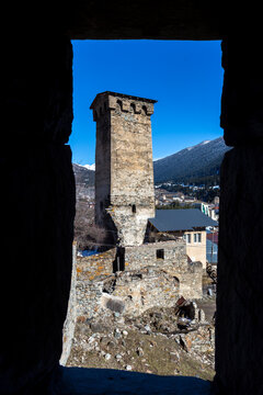 Svan tower built as defensive dwellings seen through a dark window opening, Samegrelo-Zemo Svaneti, Mestia, Georgia