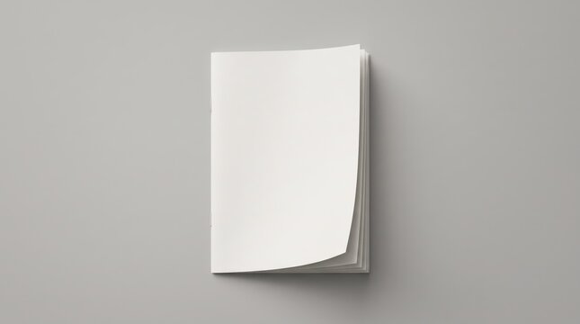 Blank white brochure mockup with curved page on gray background