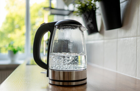 Boiling water in a glass kettle
