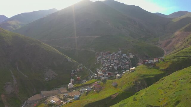 Sunlit mountain valley and Hungamek highland village, Yusufeli, Artvin, Turkey