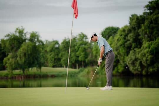  Professinal golf player on golf course. Pro golfer taking a shot. sport, golf, golfer, golfing, club,
