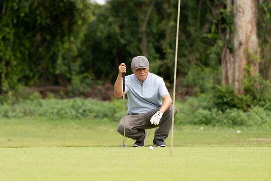 Professinal golf player on golf course. Pro golfer taking a shot. sport, golf, golfer, golfing, club,	