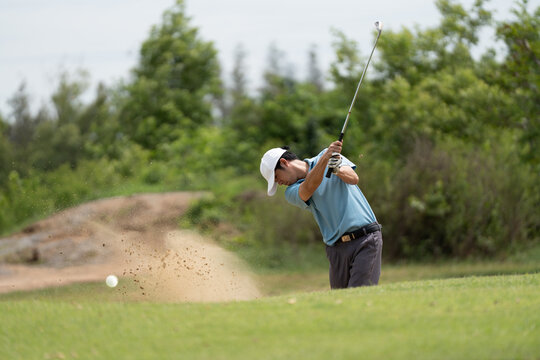 Professinal golf player on golf course. Pro golfer taking a shot. sport, golf, golfer, golfing, club,	