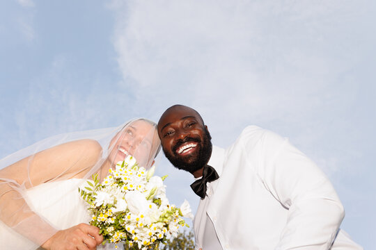 Multiracial wedding couple