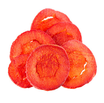 Crispy roasted carrot chips with sea salt, isolated on white background. Healthy and crunchy natural vegetable snack. Clipping path.