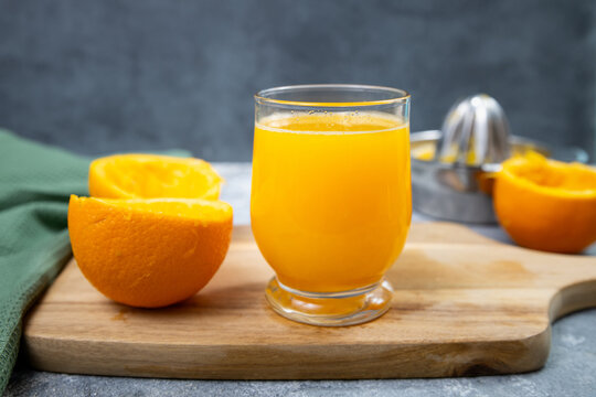 Orange juice freshly squeezed, citrus fruit peel, healthy breakfast drink, antioxidant refreshment beverage, nutrition diet