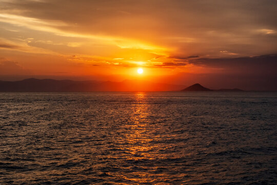 Mediterranean sunset over the sea. Setting sun. Image shows the sun setting over the Mediterranean