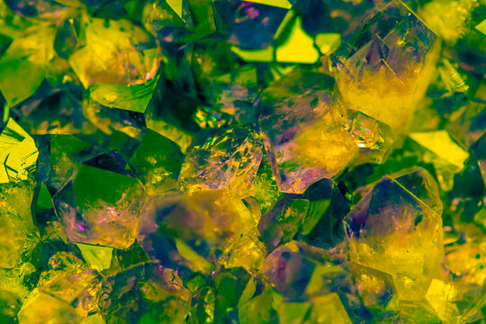 Multi-colored crystal mineral stone. Gems. Mineral crystals in the natural environment. Texture of precious and semiprecious stones. shiny surface of precious stone