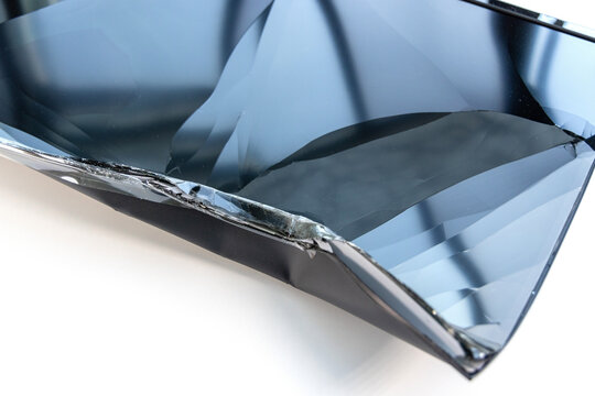 Damaged flat screen television with a shattered panel display