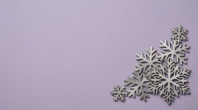 A serene and enchanting christmas backdrop featuring delicate intricately designed snowflakes against a soft lavender and white gradient evoking winter wonder