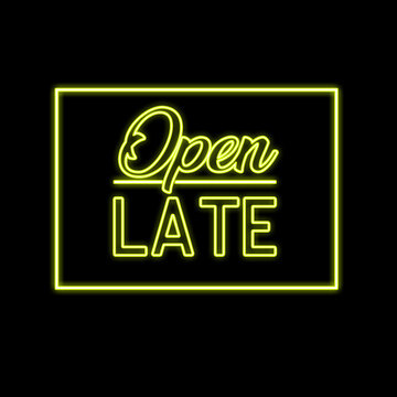 A vibrant neon sign displaying the words open late against a dark black background creating a striking visual